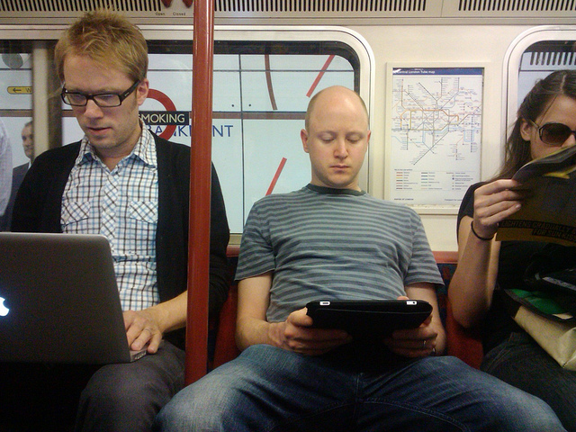 Internet device users on train.